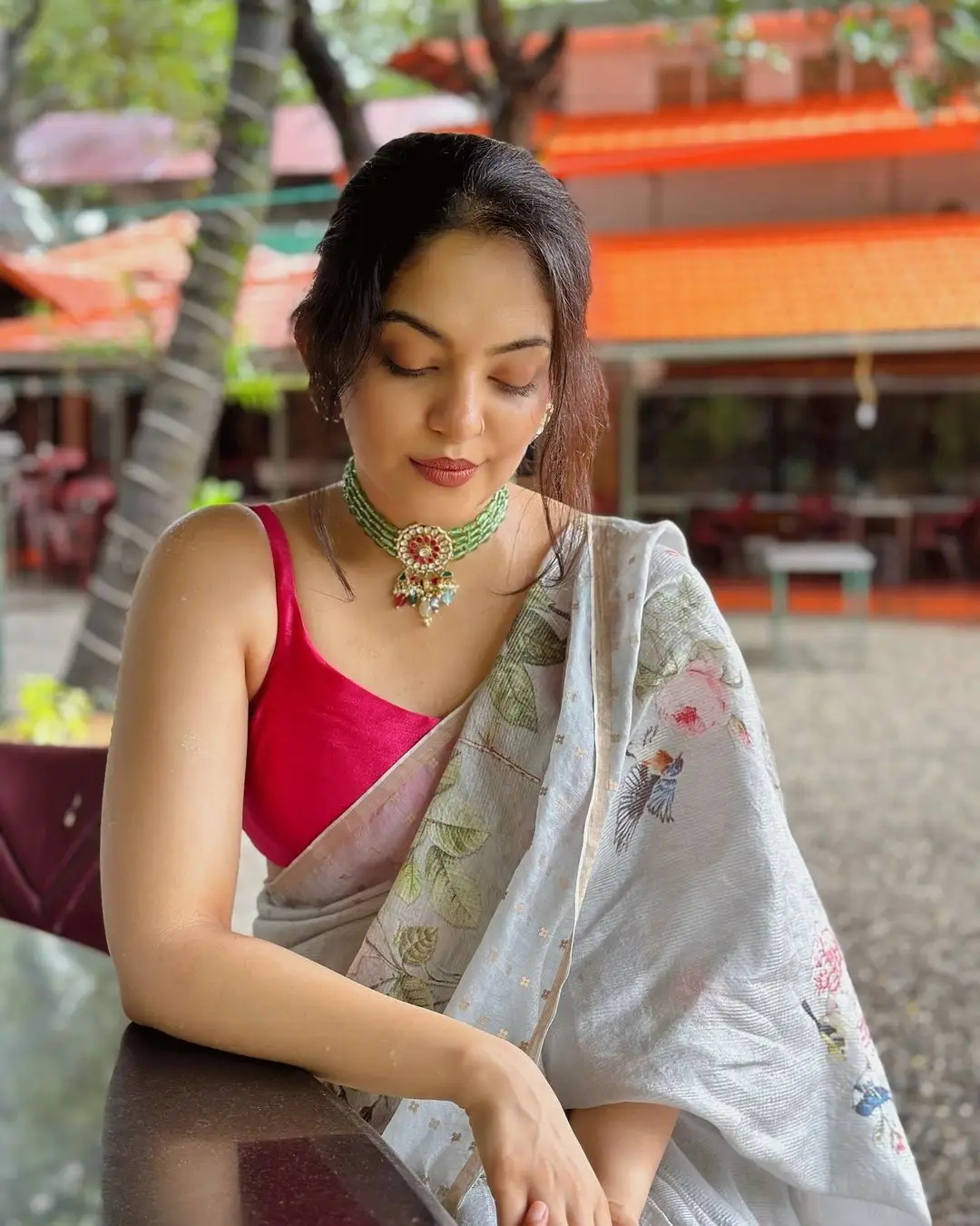 Ahaana Krishna in Green Saree Sleeveless Red Blouse